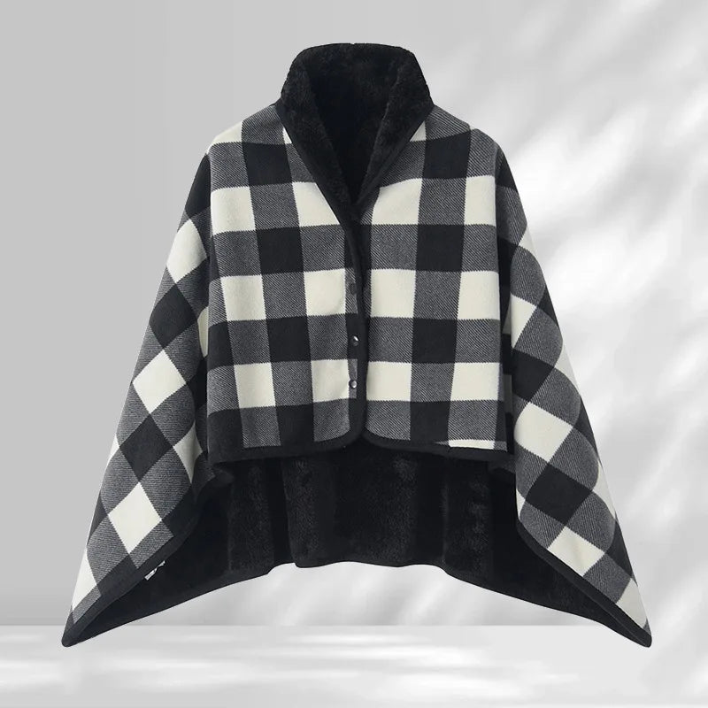Black and white checkered poncho on a gray background