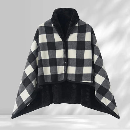 Black and white checkered poncho on a gray background
