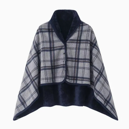 Plaid poncho with navy interior on a white background