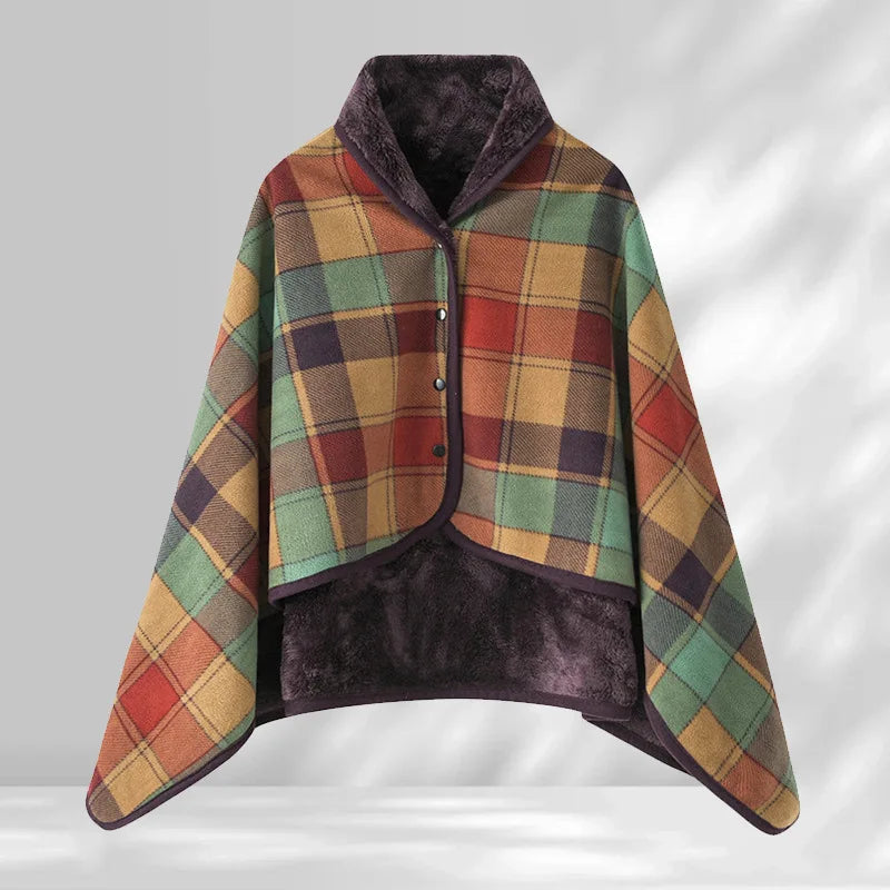 Plaid poncho with purple interior on a white background