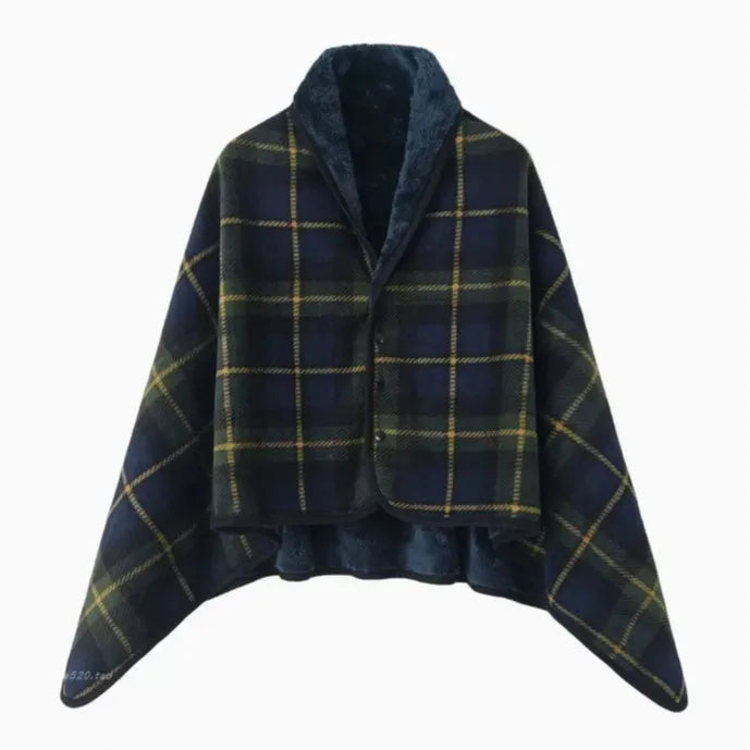 Plaid poncho with blue and green pattern on a white background
