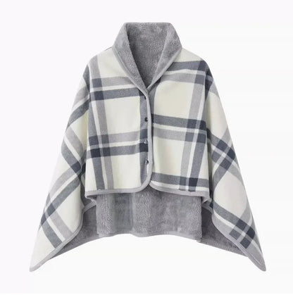 Plaid poncho with gray and white pattern on a white background